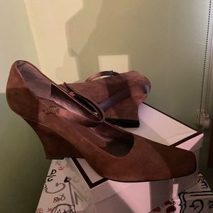 Women Nine West suede wedges.